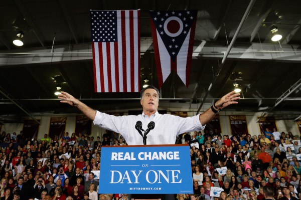 image: Republican presidential candidate Mitt Romney gestures while speaking at campaign stop at Avon Lake High School in Avon Lake, Ohio, on Oct. 29, 2012.