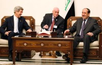 U.S. Secretary of State John Kerry meets with Iraq's PM Nouri al-Maliki