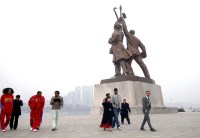 Former NBA star Dennis Rodman (2nd R, front) and his company visit the Tower of Juche Idea in Pyongyang