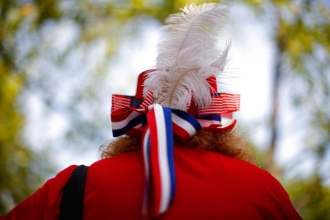 A view shows the hat of a woman as she marches in the Charlotte Labor Day Parade in Charlotte