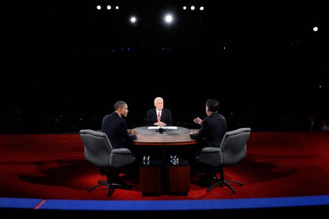 image: Moderator Bob Schieffer listens to Republican presidential candidate Mitt Romney and President Barack Obama during the third presidential debate at Lynn University in Boca Raton, Fla., Oct. 22, 2012.