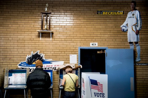 image: People fill out paper ballots while voting at Halloran Skating Rink during election day in Cleveland, Ohio, Nov. 6, 2012.