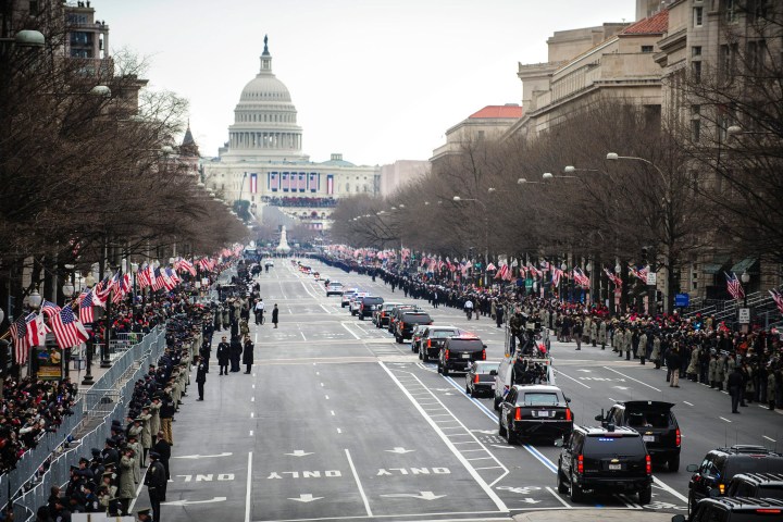President Barack Obama's motorcade makes its way to the Capitol for inauguration ceremonies where he is to be ceremonially sworn in for a second term as the 44th President of the United States in Washington, DC, on Jan. 21, 2013.