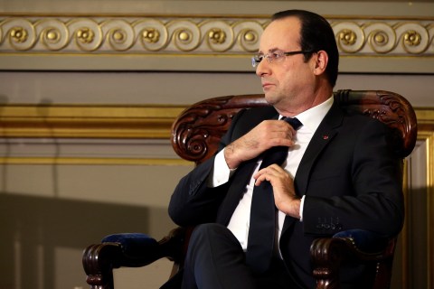 French President Hollande attends the traditional New Year ceremony which reopens France's highest court in Paris