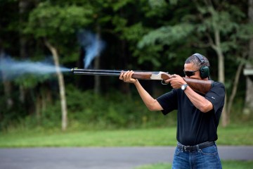President Barack Obama shoots clay targets on the range at Camp David, Md., Aug. 4, 2012.