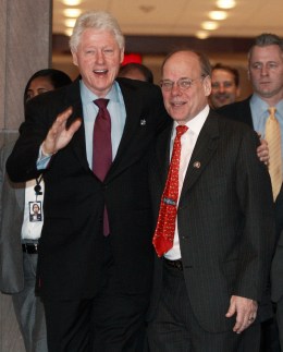 Former U.S. President Clinton arrives at a Democratic Caucus meeting in Washington