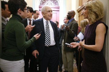 U.S. Sen. Frank Lautenberg speaks to members of the press as he arrives at the weekly Senate Democratic Policy Luncheon at the U.S. Capitol in Washington, Jan. 29, 2013.