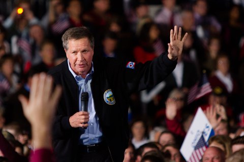 Ohio Gov. John Kasich addresses the crowd during a campaign rally with presidential candidate Mitt Romney at Port Columbus International Airport in Columbus, on Nov. 5, 2012.
