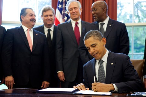 U.S. President Barack Obama signs the Korea Free Trade Agreement in Washington