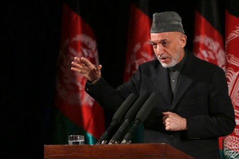 Afghan President Hamid Karzai gives a speech during an event to mark International Women's Day in Kabul