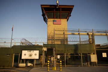 The front gate of "Camp Six" detention facility of the Joint Detention Group at the US Naval Station in Guantanamo Bay, Cuba, Jan. 19, 2012.