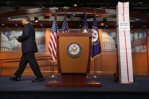 Speaker of the House John Boehner at a news conference on Capitol Hill with a printed version of the Patient Protection and Affordable Care Act, or Obamacare, in Washington, D.C., on May 16, 2013.