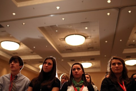Students listen as former U.S. Sen Rick Santorum speaks at the College Convention 2012 in Concord, N.H., on Jan. 5, 2012.