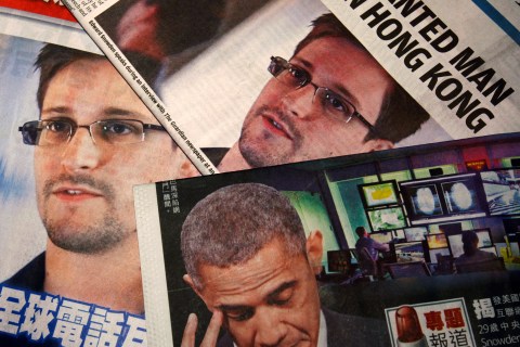 Photos of Snowden, a contractor at the NSA, and U.S. President Obama are printed on the front pages of local English and Chinese newspapers in Hong Kong in this illustration photo