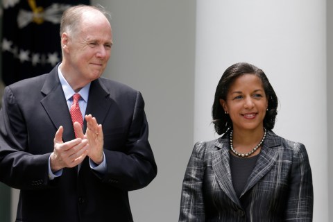 National Security Advisor Donilon applauds Rice after she was named to as his replacement in the White House Rose Garden in Washington