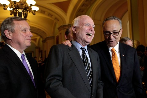 U.S. Senators Richard Durbin, John McCain and Chuck Schumer speak to the media after the Senate passed the immigration bill in Washington
