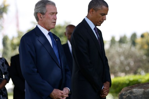 U.S. President Obama and former President Bush attend a memorial for the victims of the U.S. Embassy bombing  in Dar es Salaam