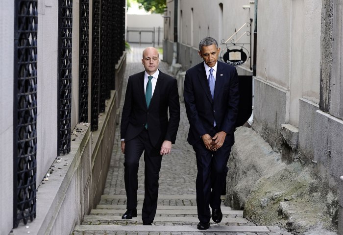 President Barack Obama is accompanied by Swedish Prime Minister Fredrik Reinfeld as he visits the Great Synagogue and Holocaust Memorial of Stockholm on September 4, 2013 in Stockholm. 