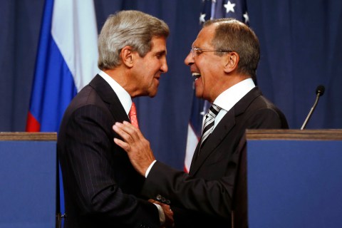 U.S. Secretary of State Kerry and Russian FM Lavrov shake hands after making statements following meetings regarding Syria, at a news conference in Geneva