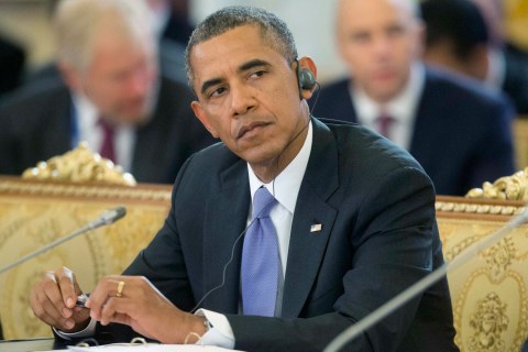 US President Obama listens to Russian President Putin during the start of the G20 Working Session in St. Petersburg