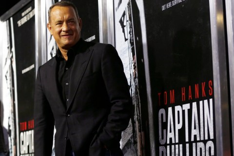 Tom Hanks poses at the premiere of "Captain Phillips" at the Academy of Motion Picture Arts and Sciences in Beverly Hills