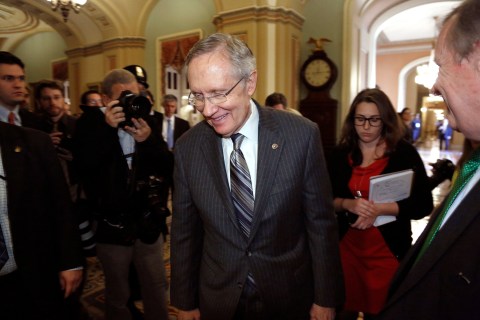 U.S. Senate Majority Leader Reid returns to the Senate floor after a Senate Democratic caucus luncheon at the U.S. Capitol in Washington