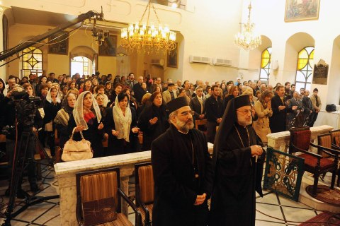 Armenian Orthodox Christians gather at their church of St Sarkis in Old Damascus for Christmas service, January 6, 2014.