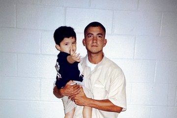 Jason Hernandez and his son Estevan during a prison visit in 1999.